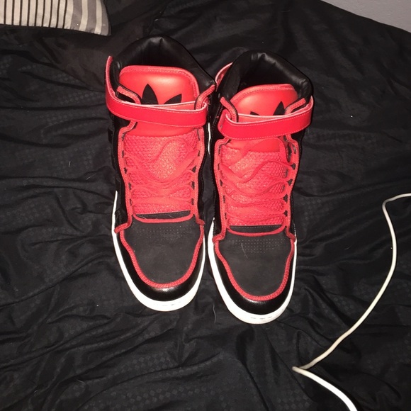 Black and red adidas shoes