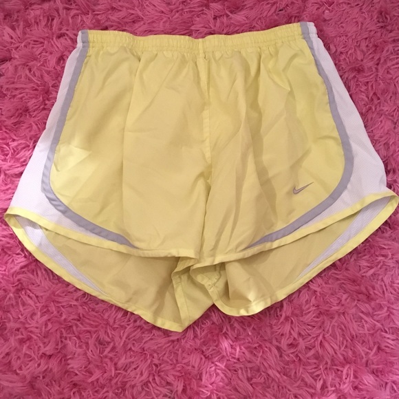 Yellow Nike tempo athletic shorts