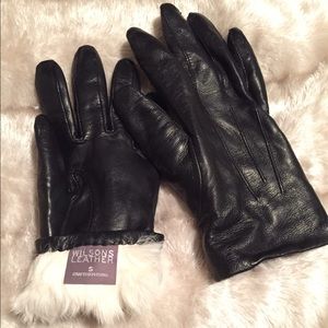 100% genuine leather gloves lined w/ rabbit fur.