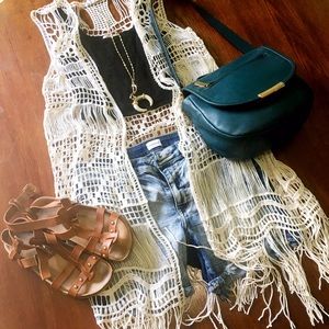Long crocheted white vest with fringe