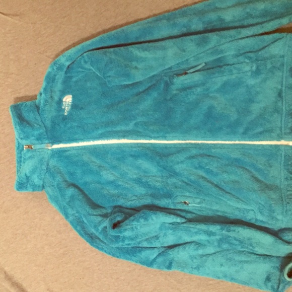 Woman's fuzzy North Face coat