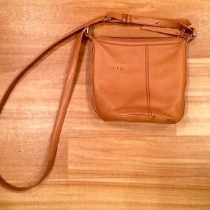 Cole Haan crossbody bag in caramel.