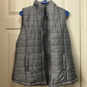 Grey puffer vest. Work once. Not my style.