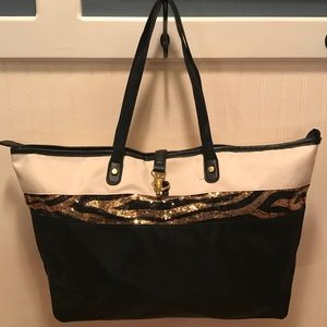 Black, white, and gold tote