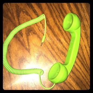 Green hand held phone plugs into your smartphone!