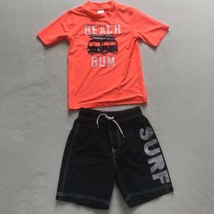 Boy's bathing suit and surf shirt