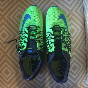 Never worn men's Nike Zoom Streak racing shoes