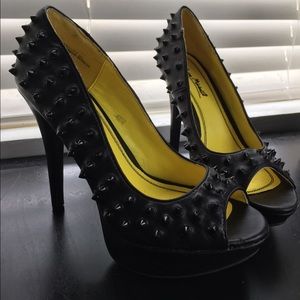 Black spiked Anne Michelle heels.