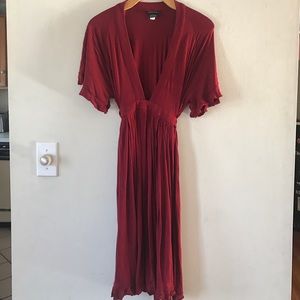 Short sleeved red dress that ties in the back.