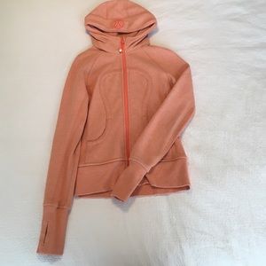 Coral colored Lululemon scuba hoodie