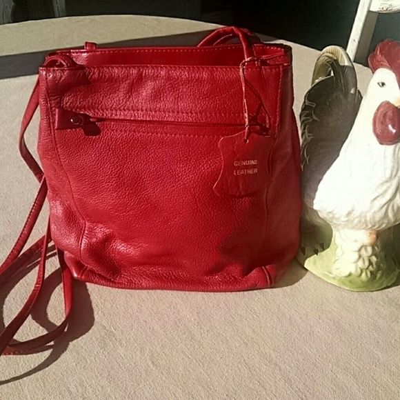 Red leather bag .
