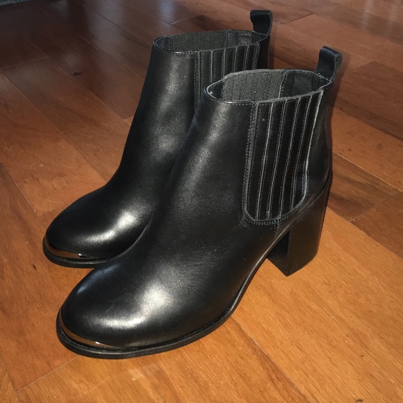 Brand new black leather heeled booties