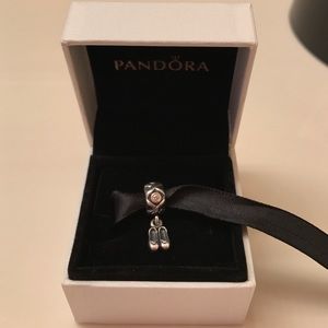 Retired dangling pandora charm.