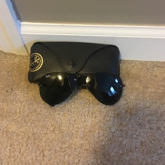 Black, frameless RayBan aviators. Great condition