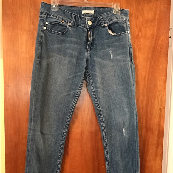 Light distressed, bottom zip skinny jeans
