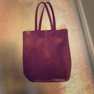 Well loved Baggu leather tote.