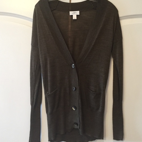 Green long sleeve cardigan sweater.