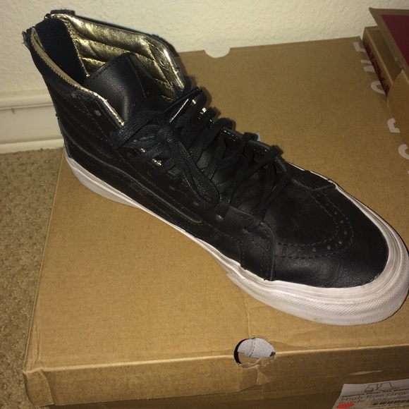 Vans black leather high tops