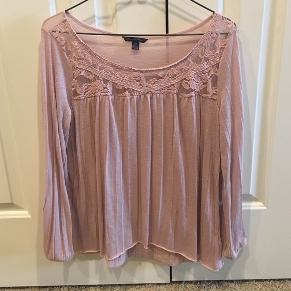 Long sleeved blush tunic with lace detail on top