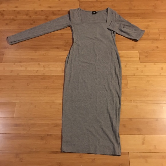 Fashion forward form fitting gray dress!