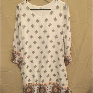 Short dress. Can also be worn with leggings.