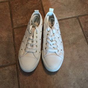 White with gold accent sneakers