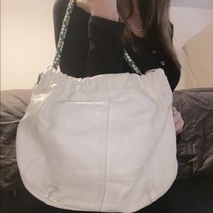 Elliot Luca original leather handbag. Unique strap