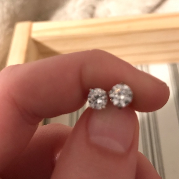 Small diamond earrings.