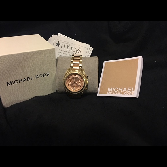 Accessories - Sold  new Michael Kors gold and rose gold watch.