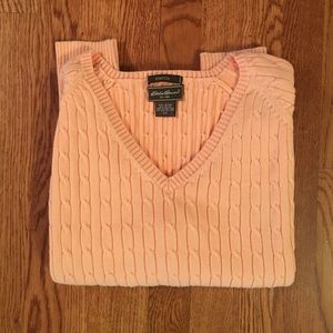 Soft pumpkin color baby cable v-neck sweater