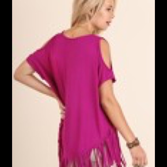 Cold shoulder top with fringe details on hem