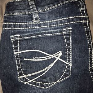 Silver Aiko boot cut jeans size 31x33 like new!