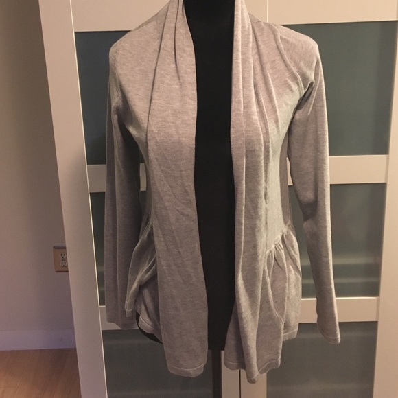 Grey sweater/ruffles detail