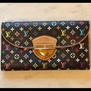 Auth. Louis Vuitton portefeuille Eugenie wallet.