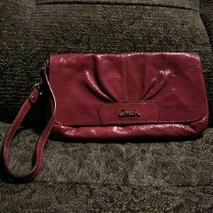 Purple coach patent clutch