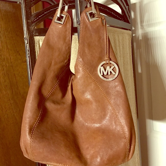 Michael Kors purse is preowned inside has some ink