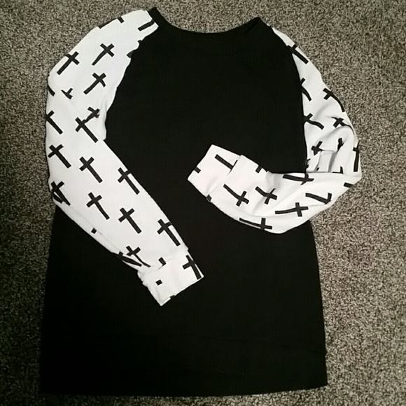 Cross sleeved sweater