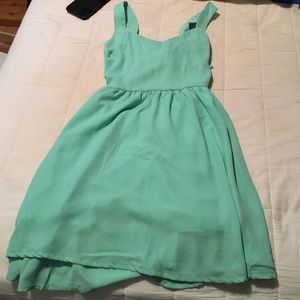 Size medium mint green dress with tie bow in back