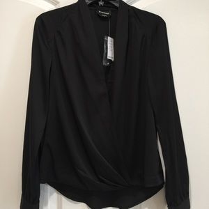 Bebe Black surplice blouse.