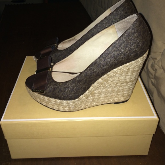 Amazon.com | Michael Michael Kors Casey Wedges for Women  Michael Kors signature wedges