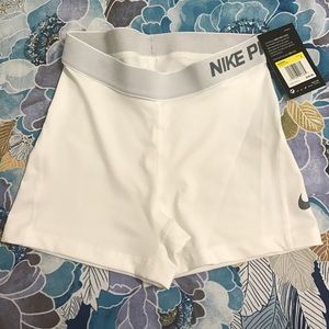 White Nike shorts