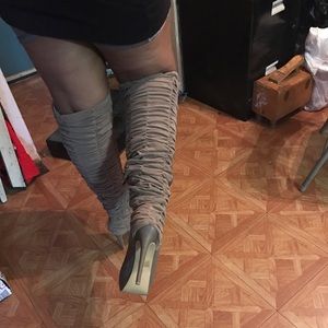 A pair of knee high boots