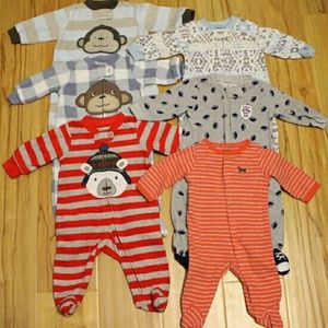 Six carter's footie pajamas