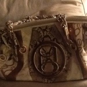 Super cute Bebe purse was originally 300.