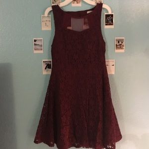 A dark red/ burgundy lace dress