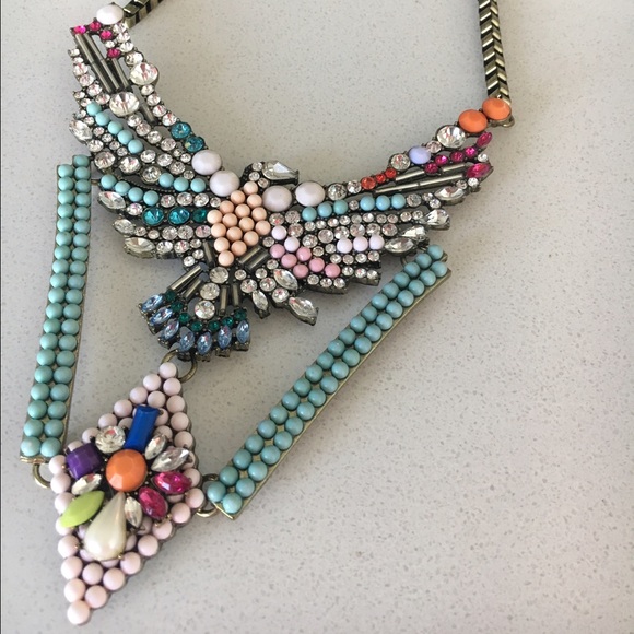Handmade crystal falcon necklace