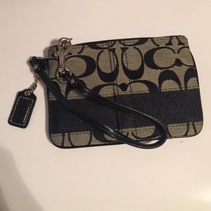 Coach Signature canvas wristlet