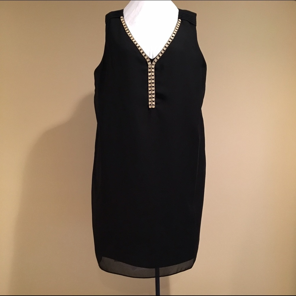 Used, SLNY black dress, size 14.
