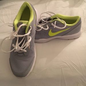 Grey and lime green Nike tennis shoes. Barely used