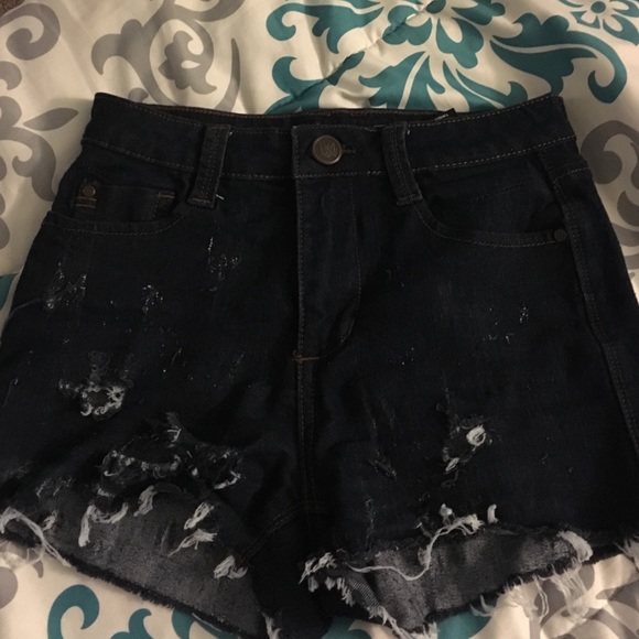 DIY dark blue denim shorts with holes